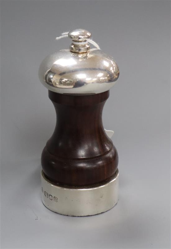 A 1970s silver mounted rosewood pepper mill, 10.8cm.